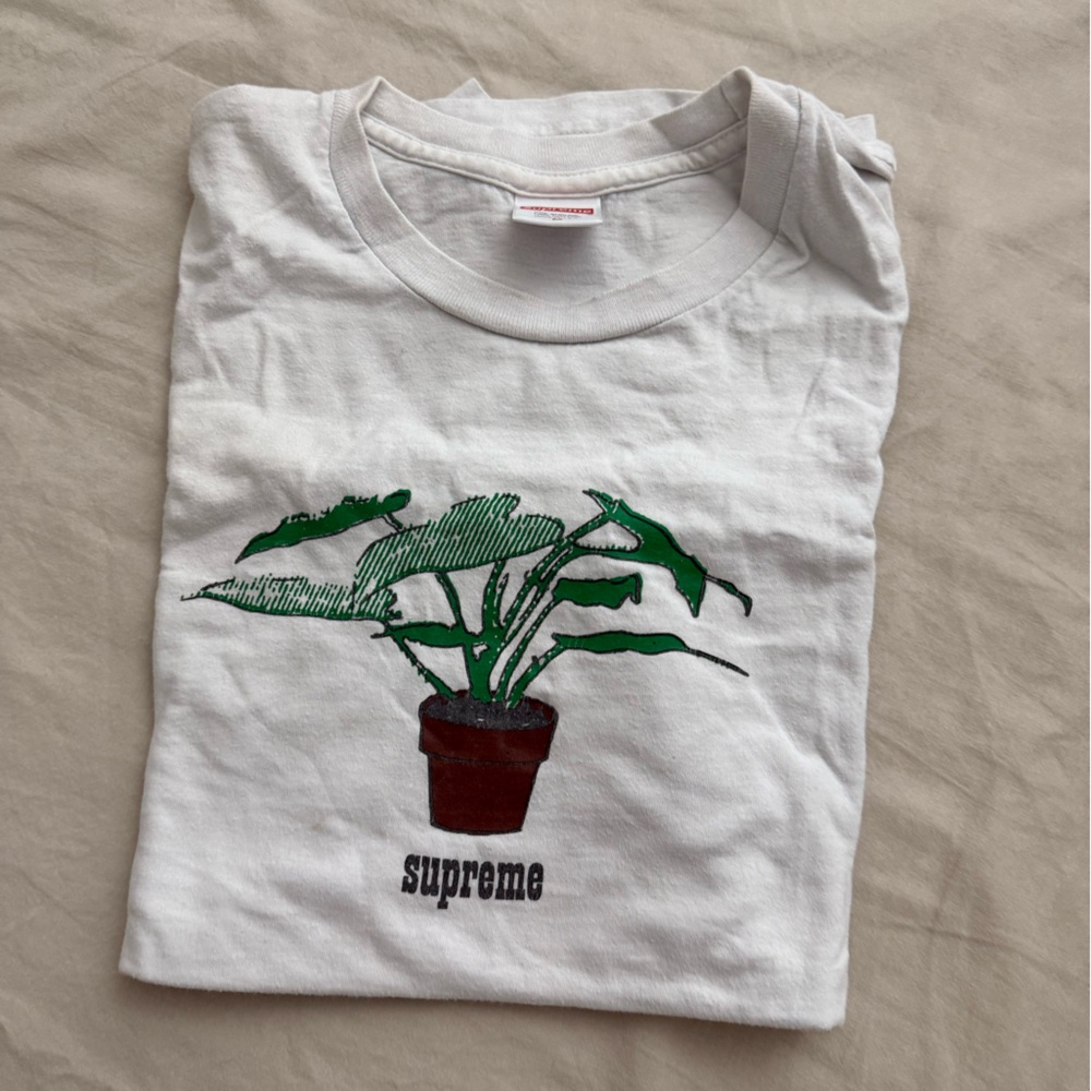 Supreme White Tee with Green Plant Design